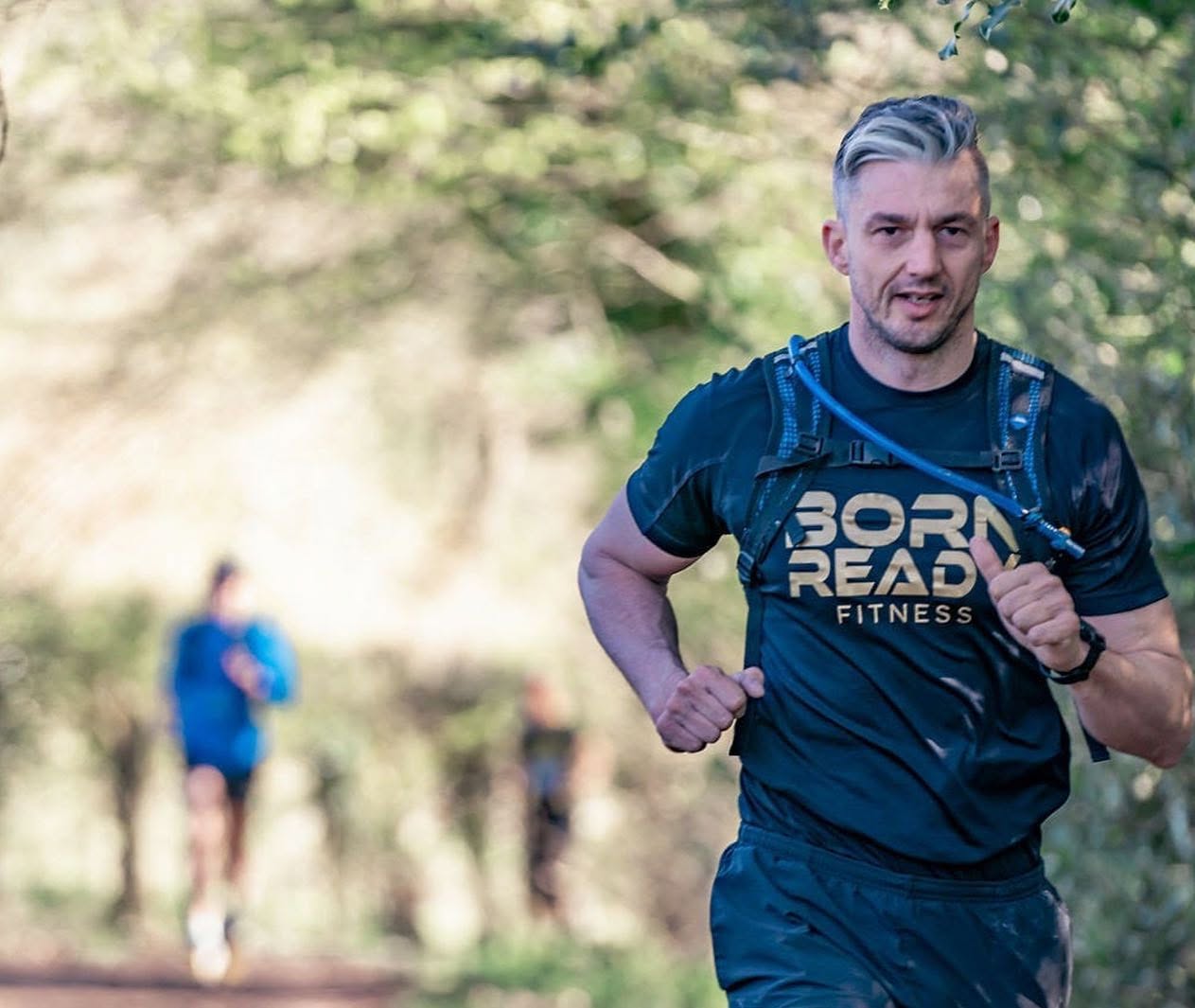 Trail running through East Sussex woodland